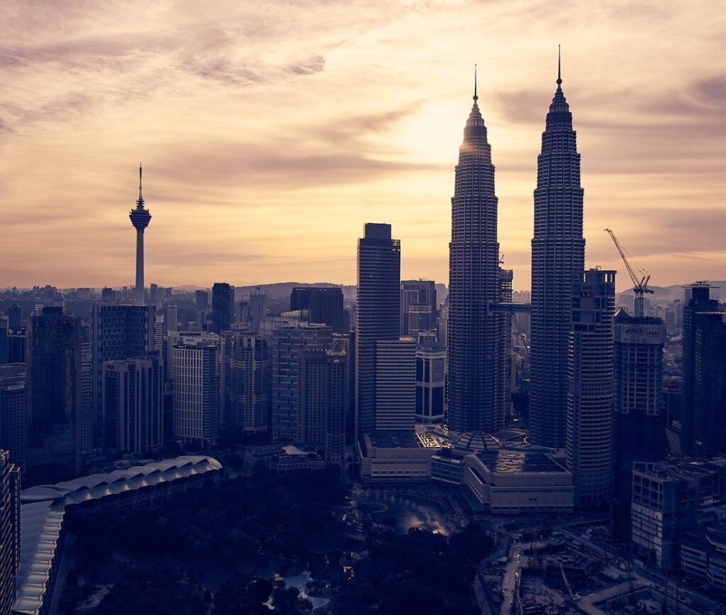 Kuala Lumpur skyline with the Petronas Twin Towers at sunset